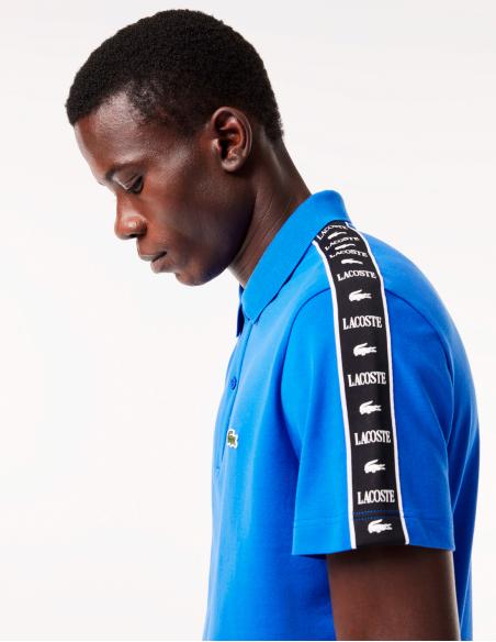 POLO LACOSTE DE PIQUÉ ELÁSTICO CON RAYA Y LOGO