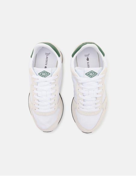 Zapatillas blancas con detalles verdes