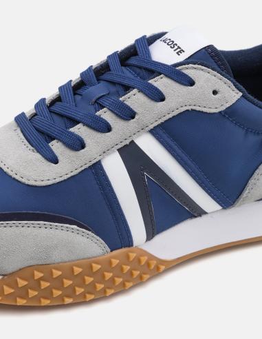 Blue suede Lacoste tennis shoe Blue suede Lacoste tennis shoe