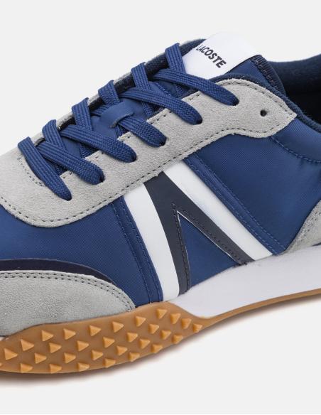 Blue suede Lacoste tennis shoe