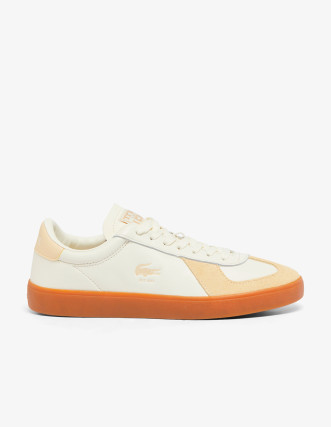 Zapatilla Lacoste en blanco roto con suela naranja