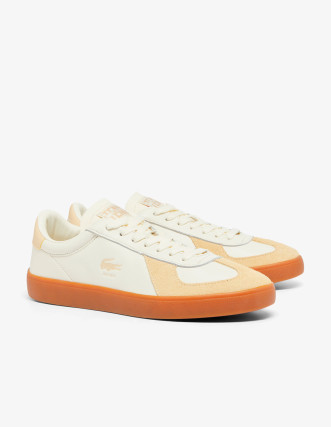 Zapatilla Lacoste en blanco roto con suela naranja 2