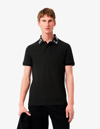 Polo Lacoste negro con anagrama en el cuello. Polo Lacoste de hombre online 2