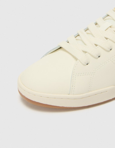 White Lacoste Carnaby sneaker closeup
